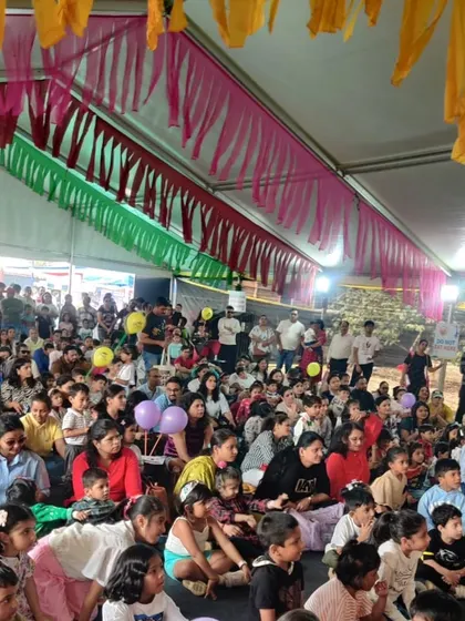 A view of the massive, engaged audience at one of our festival performances. It's amazing to see so many families gathered to enjoy a shared storytelling experience.
