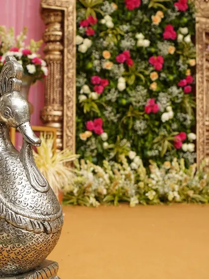 Another shot of the silver peacock, a symbol of grace and beauty in Indian culture. It was a perfect addition to the decor for this intimate and traditional half-saree function.