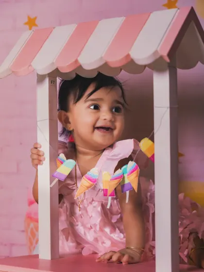 A sweet smile that's as delightful as ice cream. This close-up captures the pure joy of the moment.