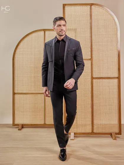 A full-length view of the precision-stitched suit, showing how it creates a strong, confident stride. It's designed for the man who leads.