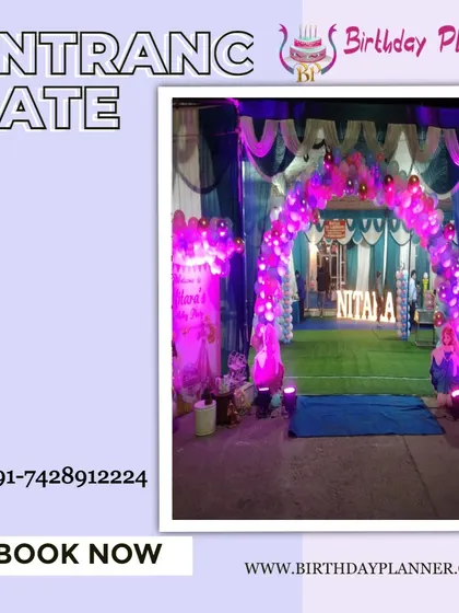 A vibrant entrance gate for Nitala's party. A purple balloon arch under a tented structure leads to an area with the name displayed in large marquee letters, creating a personalized and exciting welcome.