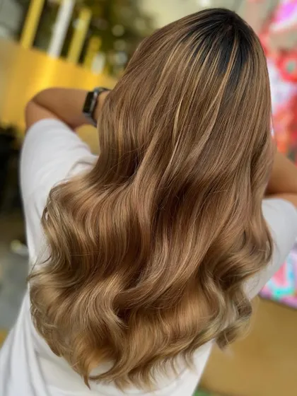 Embracing the ash blonde side of life. This look features cool, ashy tones for a modern and chic style.