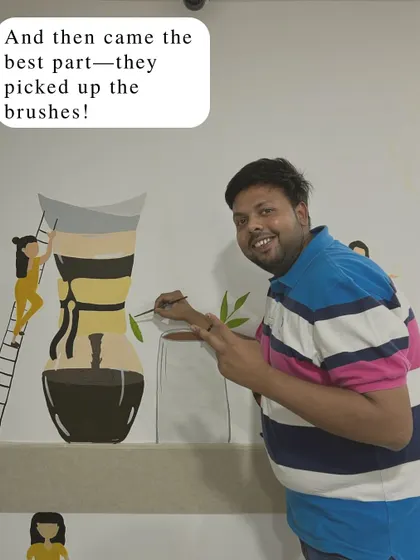 And then came the best part: the employees picked up brushes themselves! It was so much fun to see them add their own strokes to the wall.