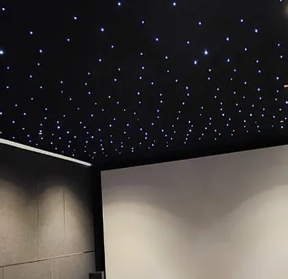 A close-up of the starlit ceiling, a popular feature that adds a touch of magic and ambiance to any home cinema.
