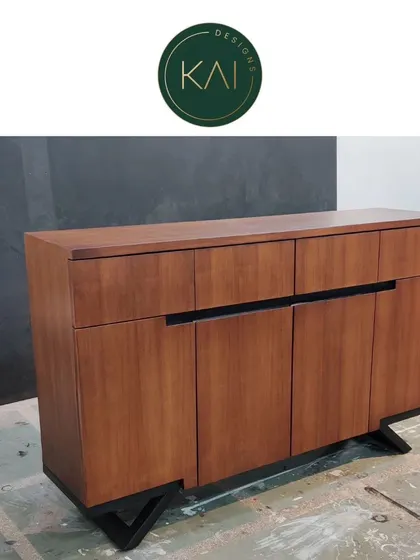 The same wooden sideboard shown in our workshop, highlighting its sturdy construction and the natural grain of the wood before the final finishing touches.
