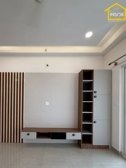 This entertainment unit was designed as part of a complete bedroom makeover, providing storage and a focal point without overwhelming the serene feel of the space.