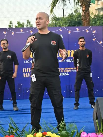 Addressing the audience with my instructors behind me. We present a united front, showcasing the strength and professionalism of our team.