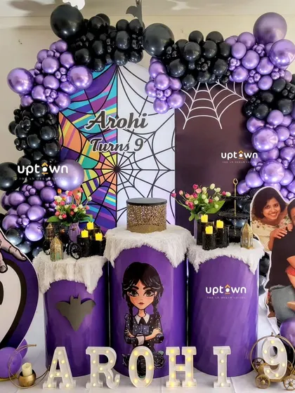 The full setup for the Wednesday Addams party, complete with a 'Thing' prop.