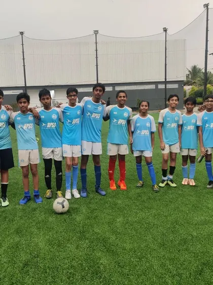 The U-13 team with their coach, ready to compete in the TFP Cup.