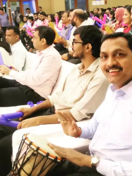 A candid shot from a Suryoday Bank anniversary event, where employees participated in a team-building drum circle. I focus on capturing genuine expressions of joy and engagement, delivering photos that feel authentic and full of life.