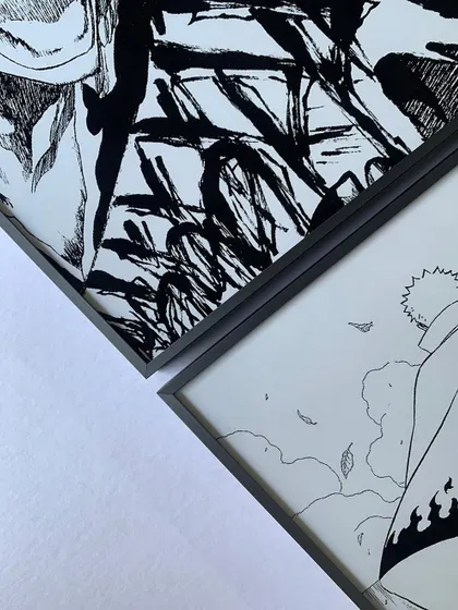 Bring your favorite anime and manga moments to life with custom framing. For this client, we framed a series of iconic black and white panels in our sleek gray metal frames for a sharp, modern display.