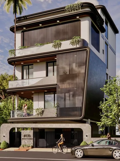 This modern 40x60 house in Basavanagudi was planned with minimalist architecture and cross-ventilation principles. The facade features a dynamic interplay of solid forms and vertical screens.