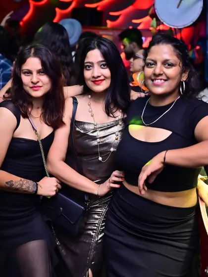 The party crowd dressed up and ready for a fun night out. Clicks from a packed Friday night gig.