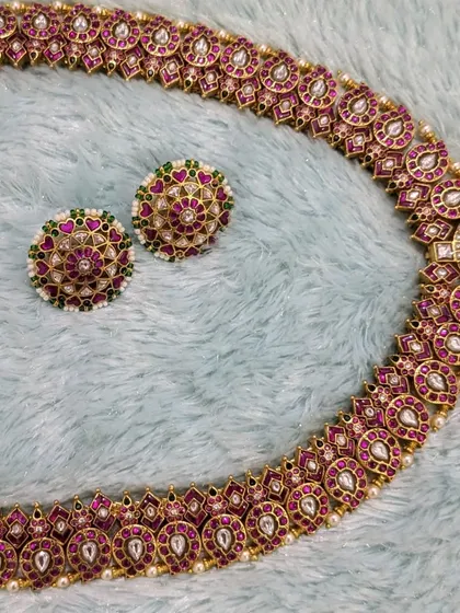 The full Jadau haara and stud earring set, a timeless and elegant combination.