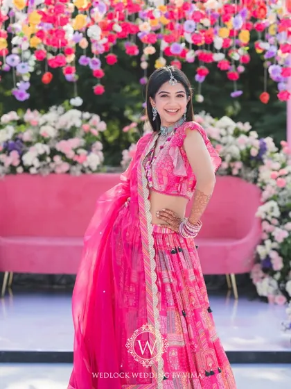 Celebrating one of our own with a vibrant Mehendi on a home terrace. The decor was filled with colorful hanging flowers and lush floral arrangements, creating a joyful setting for lots of dancing and fun.