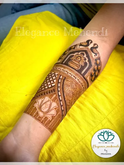 A bridal hand demo for my offline class, featuring peacocks, a kalash, and a lotus.