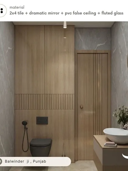 A bathroom design for Balwinder in Punjab, featuring a unique combination of 2x4 tiles, a dramatic mirror, a PVC false ceiling, and fluted glass for a textured, high-end look.