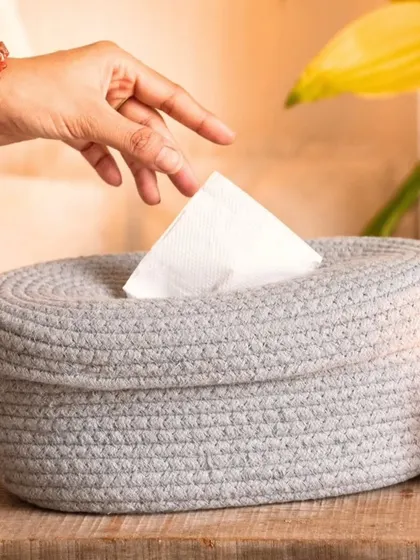 See how easily a tissue dispenses from our rope basket. It's a functional and aesthetically pleasing accessory for your living room, bedroom, or bathroom.