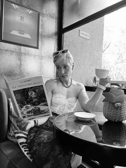 A guest enjoying my signature breakfast bowl. It's always a pleasure to see people enjoying the food I've put so much thought into.