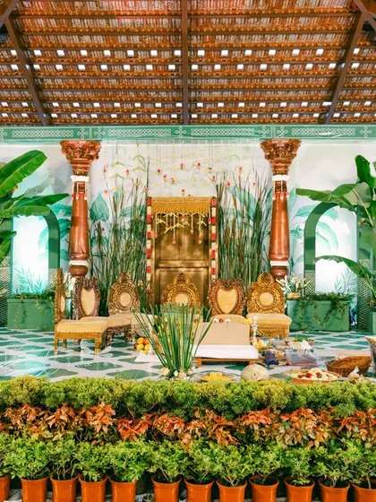 A full view of the Muhurtham stage, showcasing the intricate details and the harmonious blend of traditional and contemporary design elements.