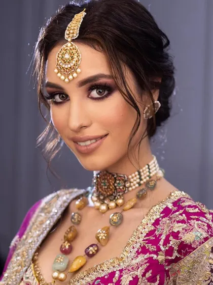 A smiling bride showcasing the regal look. My classes are designed to build your skills and your confidence.