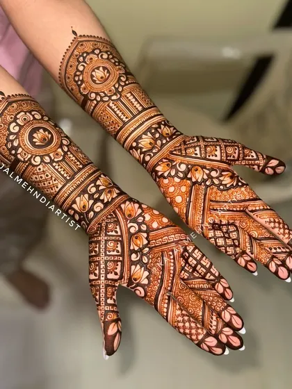 A beautiful design for the groom's sister with intricate patterns.