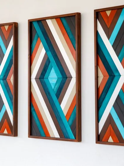 An angled view of the boho wall decor set, emphasizing its framed construction and the depth of the mosaic pieces.