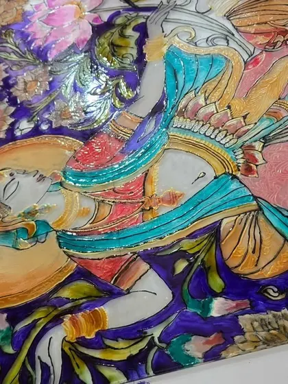 Discover the delicate art of glass painting, a unique craft that transforms a simple piece of glass into a stunning work of art. This intricate piece showcases the beautiful results of combining traditional design with modern color techniques.