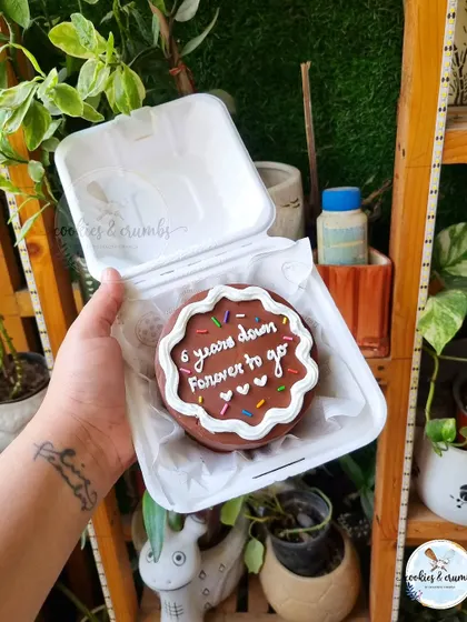 A chocolate bento cake for a 6-year anniversary. These mini cakes are perfect for celebrating relationship milestones, big or small.