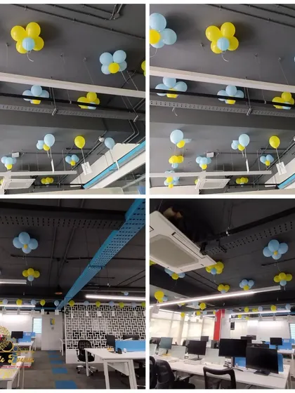 More views of the Zolostays anniversary, focusing on the ceiling decor. I used simple balloon flowers and scattered balloons to add a festive touch above the workstations without obstructing the space.