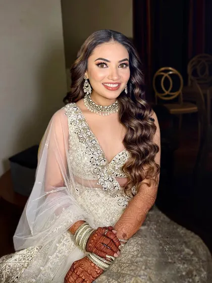 Another shot of this smiling Sangeet bride. The makeup is designed to be photogenic and long-lasting.
