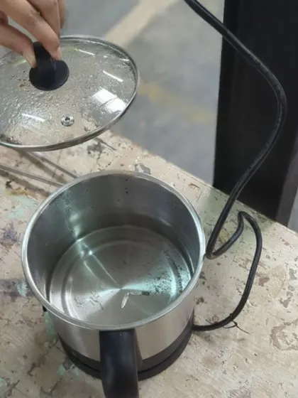 An essential step in the process: pickling. After being heated, the silver piece is placed in a warm acid bath to clean off oxidation and flux.
