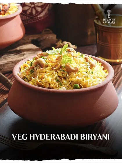 Our Veg Hyderabadi Biryani, cooked in a traditional clay pot to lock in the aromatic spices and flavours. A royal dish for a royal celebration.