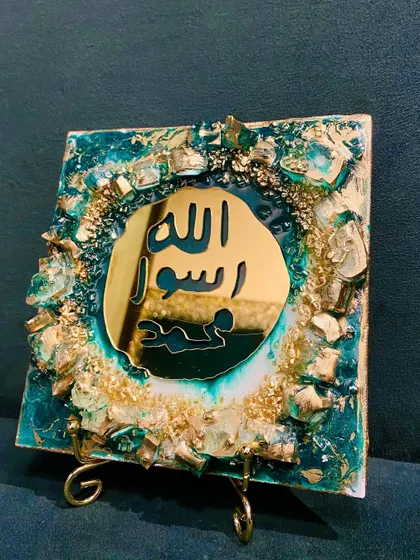 The emerald green Mohr e Nabuwat tabletop piece, a perfect small gift or decor item.