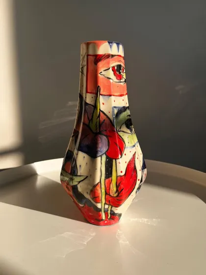 A third view of the ceramic vase.