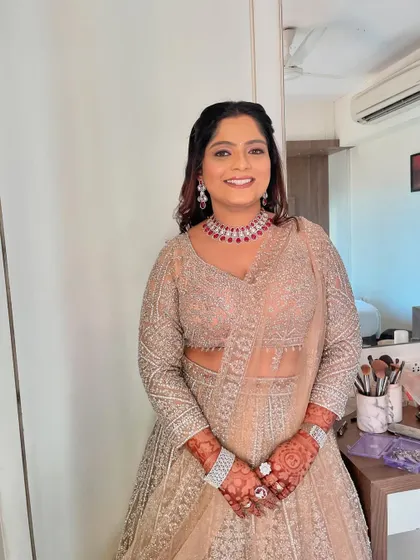 My bride Pari, looking elegant and radiant for her reception. We chose a soft glam look with a ruby necklace that adds a beautiful pop of colour.