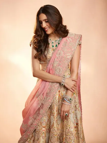 A full-length view of the pastel Anamika Khanna lehenga. It’s a look that is both gentle and incredibly regal.