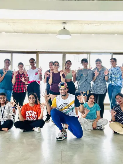 A group photo with the talented students at Srishti College after a fun dance fitness workshop.