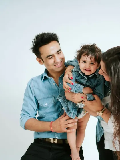A family that twins in denim together, stays together. This coordinated look is fun and creates a cohesive family portrait.