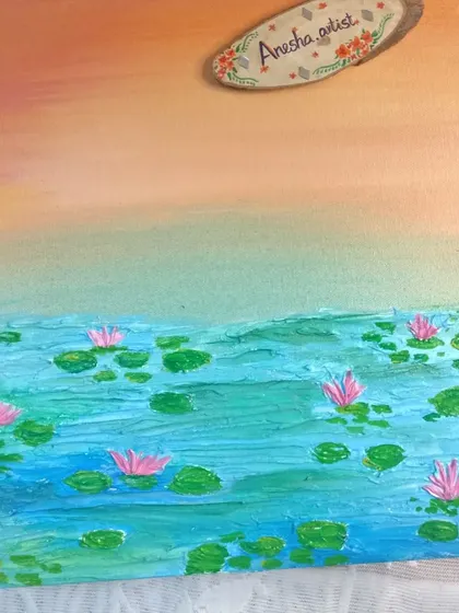 The water lily painting displayed on my desk.