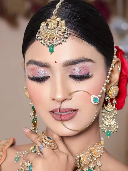 A close-up of the pink glitter eye makeup. My students learn how to apply glitter for maximum impact without it looking messy.