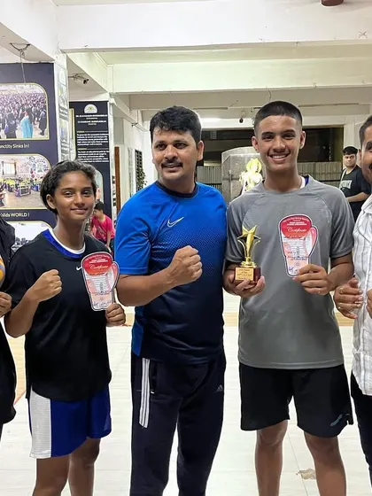 A proud moment for our coach and boxers after a successful tournament. Here, our team celebrates with Neel, who was named 'Star Boxer' at the 83rd ICCBS event in Kalyan.
