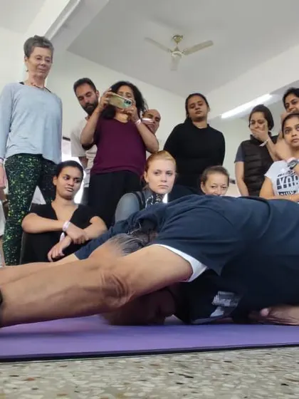 Salabhasana (Locust Pose), a backbend that strengthens the entire back of the body.