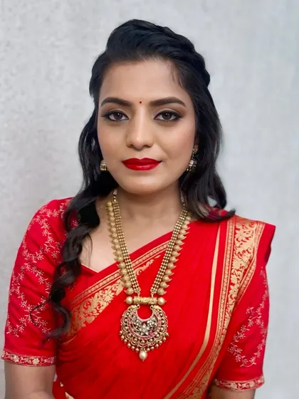A close-up of the classic red lip and defined eye makeup. This is a versatile look that I teach in my personal makeup classes, as it suits so many occasions and outfits.
