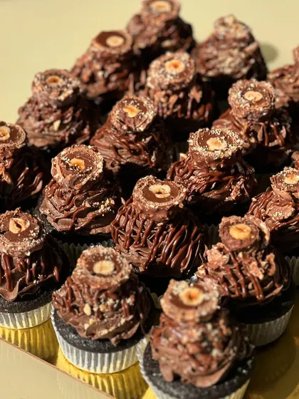 Another angle of the rich and indulgent Ferrero Nutella cupcakes, showcasing the generous Nutella mousse topping.