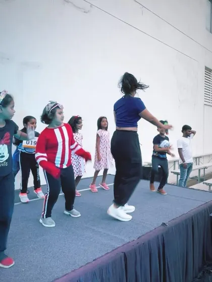 In my element leading a dance session for kids. My ability to connect with all age groups makes me a versatile choice for family-friendly brand events and community activations.