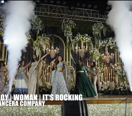 The final pose of an epic bridesmaids' performance. The combination of elegant outfits, synchronized moves, and stage effects created a truly show-stopping moment.