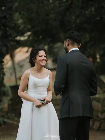 The bride's joyful reaction during their private vow exchange.