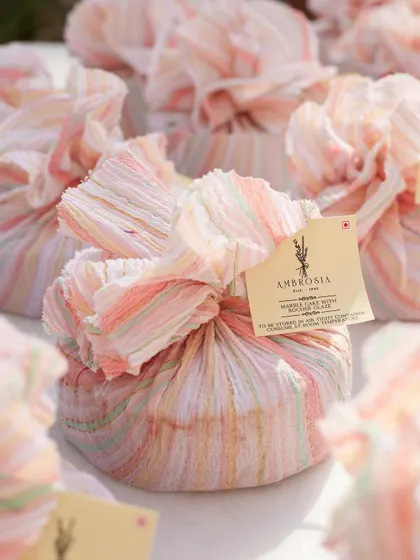 A close-up of our furoshiki-style fabric-wrapped gifts. This sustainable and elegant packaging option can be customized for any corporate or personal event.