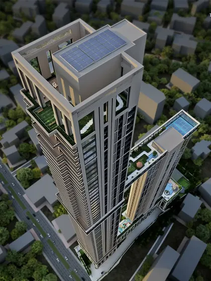 An overhead view of the South Mumbai towers, showcasing the intelligent use of space. The design integrates a rooftop pool and green spaces, demonstrating our commitment to creating functional and beautiful amenities even at great heights.